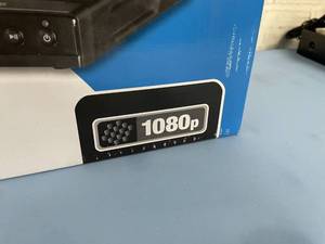 lot 27 image: Lot of 2 - NEW - Dynex DVD Players with HD 1080p Up-Conversion