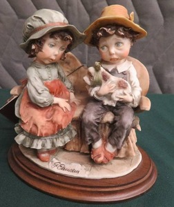 FIGURINE BY GUISEPPE ARMANI