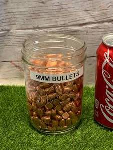 JAR FULL OF 9mm BULLETS