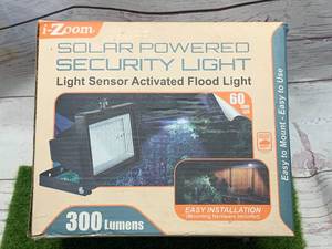 NEW OPEN BOX SOLAR POWERED SECURITY LIGHT