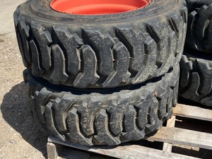 lot 6 image: Set Of (4) Skid Loader Wheels & Tires