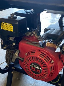 lot 14 image: Coleman Powermate HP-3500 Portable Generator
