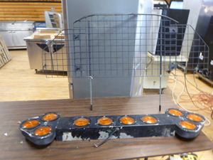 lot 20 image: Caution Arrow with Metal Rack