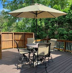 38 Round Stone Top Patio Table With Unbrella And Four Metal And Fabric Chairs td