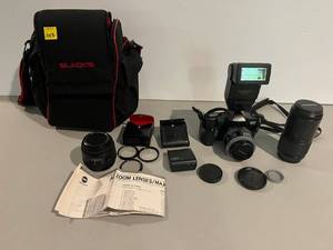 Minolta Maxxum 3000i Camera With Quantaray Zoom Lenses, Quantaray Flash And More d