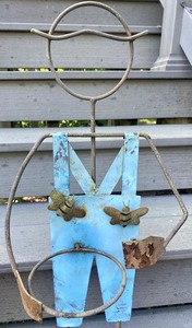 lot 105 image: Two Fun Decorative Garden Plant Holders