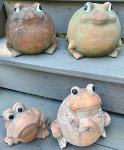lot 103 image: Seven Whimsical Outdoor Frog Figurines