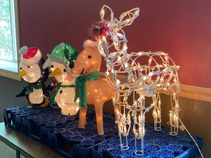 lot 65 image: Fun Light Up Christmas Characters