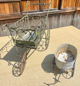 lot 110 image: Two Decorative Planters on Wheels