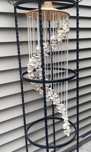 lot 213 image: Beautiful Black Metal Stand with Seashell Chime