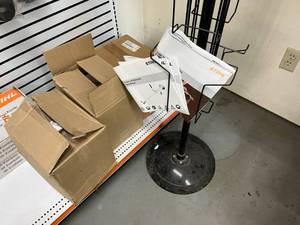 lot 97 image: Stihl Catalogs & SpinnerDisplay Rack