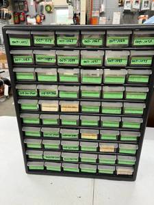 lot 117 image: Storage Unit Full of Small Engine Repair Parts