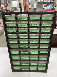 lot 118 image: Storage Unit Full of Small Engine Repair Parts