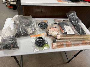 lot 150 image: Table Full of Stihl Parts