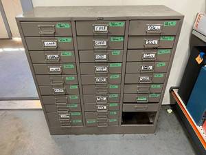 lot 165 image: Large Metal Storage Unit Full of Stihl Carburetors, Ignition Modules & Other Parts