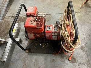 lot 279 image: Homelite 2500 Generator & Cords