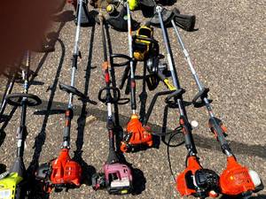 lot 98 image: Lot of Timmers and Chainsaws for parts or repair