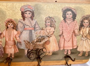 Adorable Doll Themed Decorative Wall Hooks on Wood Panel