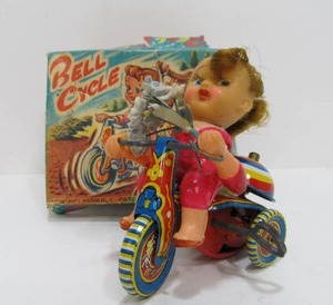 lot 238 image: Vintaeg Japanese Tin Toy wBox - Girl Riding Trike wFlowers