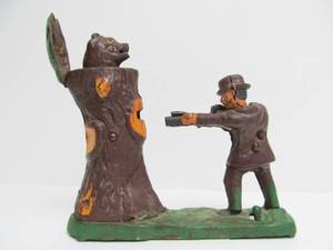 lot 159 image: Vintage TEDDY ROOSEVELT Cast Iron Mechanical Bear Hunting Bank