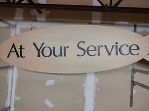 At Your Service Sign