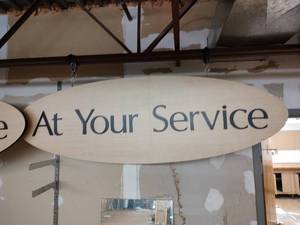 At Your Service Sign
