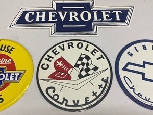 Four Metal Chevrolet Signs