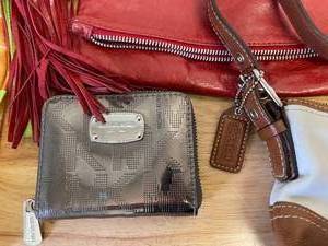 lot 51 image: Lot of Various Handbags and Wallets, Coach, Michael Kors, and More