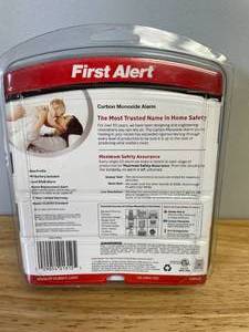 lot 13 image: First Alert Plug in Carbon Monoxide Detector with Battery Backup