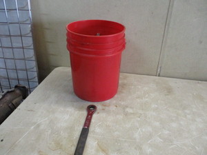 Bucket of ratchet wrenches