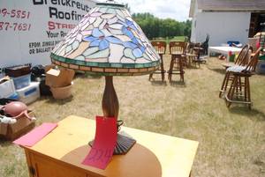 lot 224 image: Tiffany style lamp. 24 inches tall...