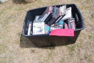 lot 250 image: Tote of DVDs and a few VHS tapes...