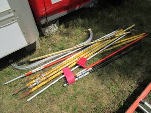 lot 118 image: Several steel extension poles and l...