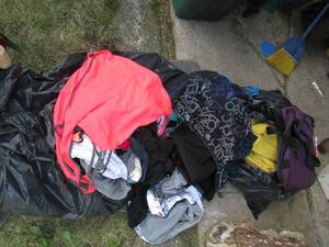 lot 147 image: (2) garbage bags with an assortment...