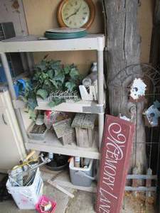 lot 164 image: IndoorOutdoor lawn decor, tall woo...