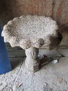 lot 189 image: cement and Rock textured bird bath....