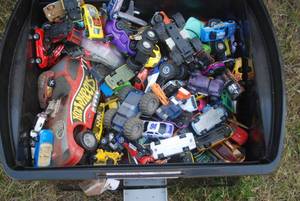 lot 293 image: Covered tote overflowing with a mas...