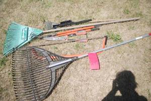 lot 297 image: yard warrior lot with rakes, pruner...