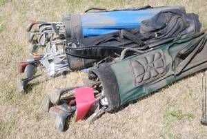 lot 300 image: (3) bags of clubs from Biocurve, De...