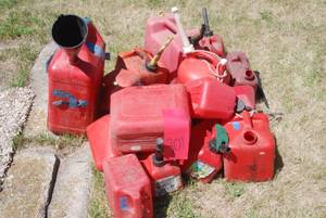 lot 301 image: Small Mountain of plastic gas cans ...