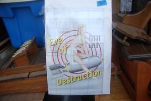 lot 46 image: Pin up blonde on rocket metal man ...