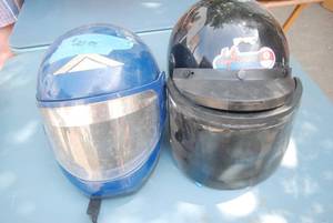 lot 59 image: Lot of two helmets. Blue says Nova,...