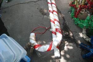 lot 78 image: Two 120 inch tall christmas  candy canes. Not ...