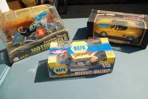 lot 375 image: Lot of three die cast cars. See pic...