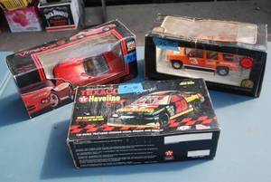 lot 377 image: Lot of three die cast cars in packa...