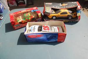 lot 378 image: Two die cast cars and one plastic c...