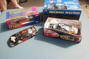 lot 379 image: 3 die cast cars and one plastic col...