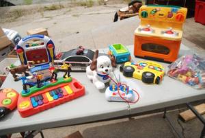lot 447 image: (2) Boxes of toys ranging from baby...