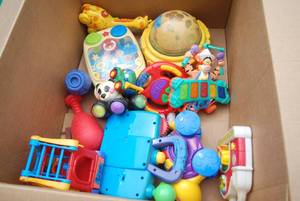 lot 457 image: (1) Tote and (1) Box of toys rangin...