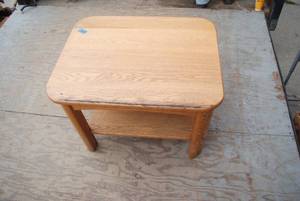 lot 490 image: Light Toned wood end table with sto...